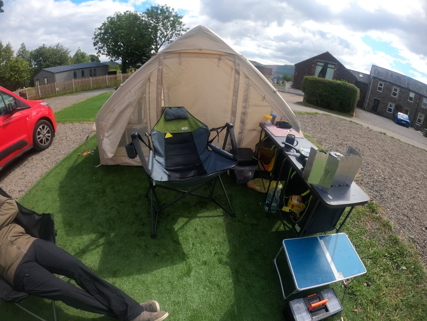 Dave's tent with his rocking chair and organised outdoor kitchen beside it