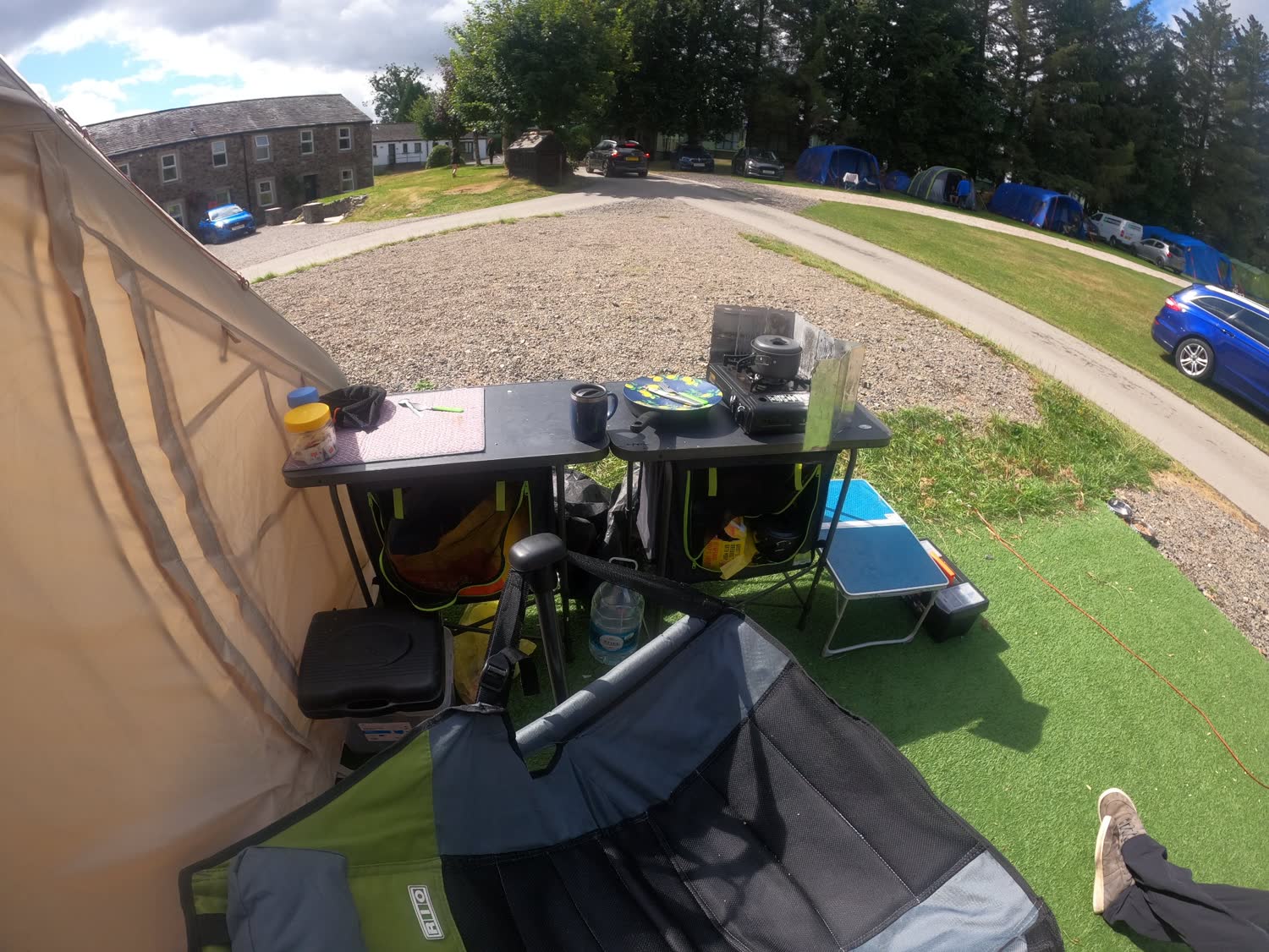 The campsite cooking tables, stove, wind guard and storage cupboards